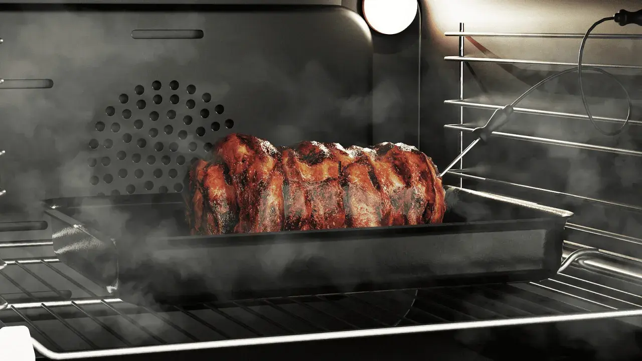 Soczysta pieczeń w dymie, pieczona w piekarniku z termometrem. Grill w piekarniku daje idealnie przypieczone żeberka.