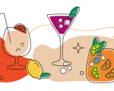 Kolorowe drinki z Cointreau, cytryny, pomarańcze i shaker do koktajli.