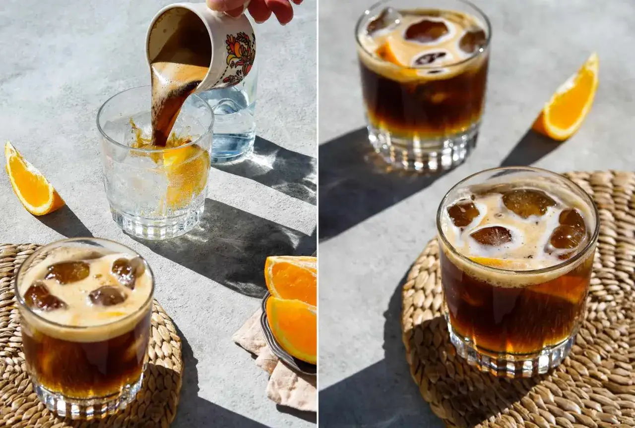 Orzeźwiający tonic espresso z plasterkiem pomarańczy i lodem. Idealny na gorące dni.